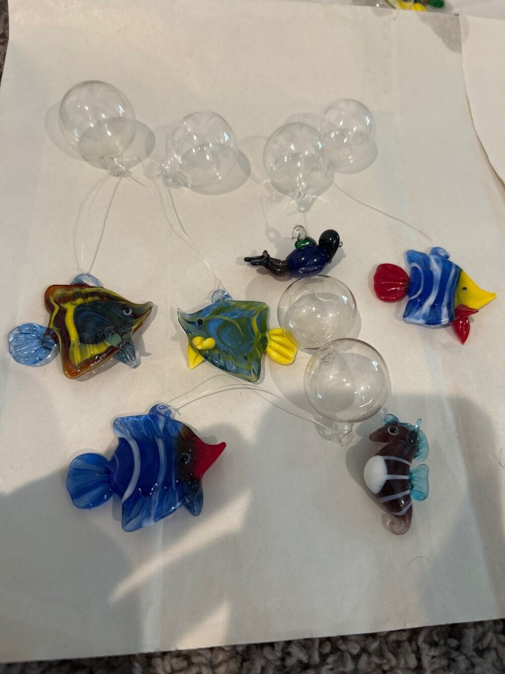 Floating Glass Aquarium Ornaments including a fish, scuba diver and a sea horse